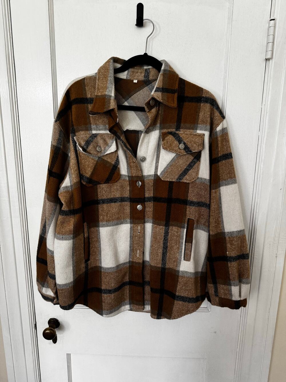 Boho brown, tan, and white plaid flannel button-up shacket